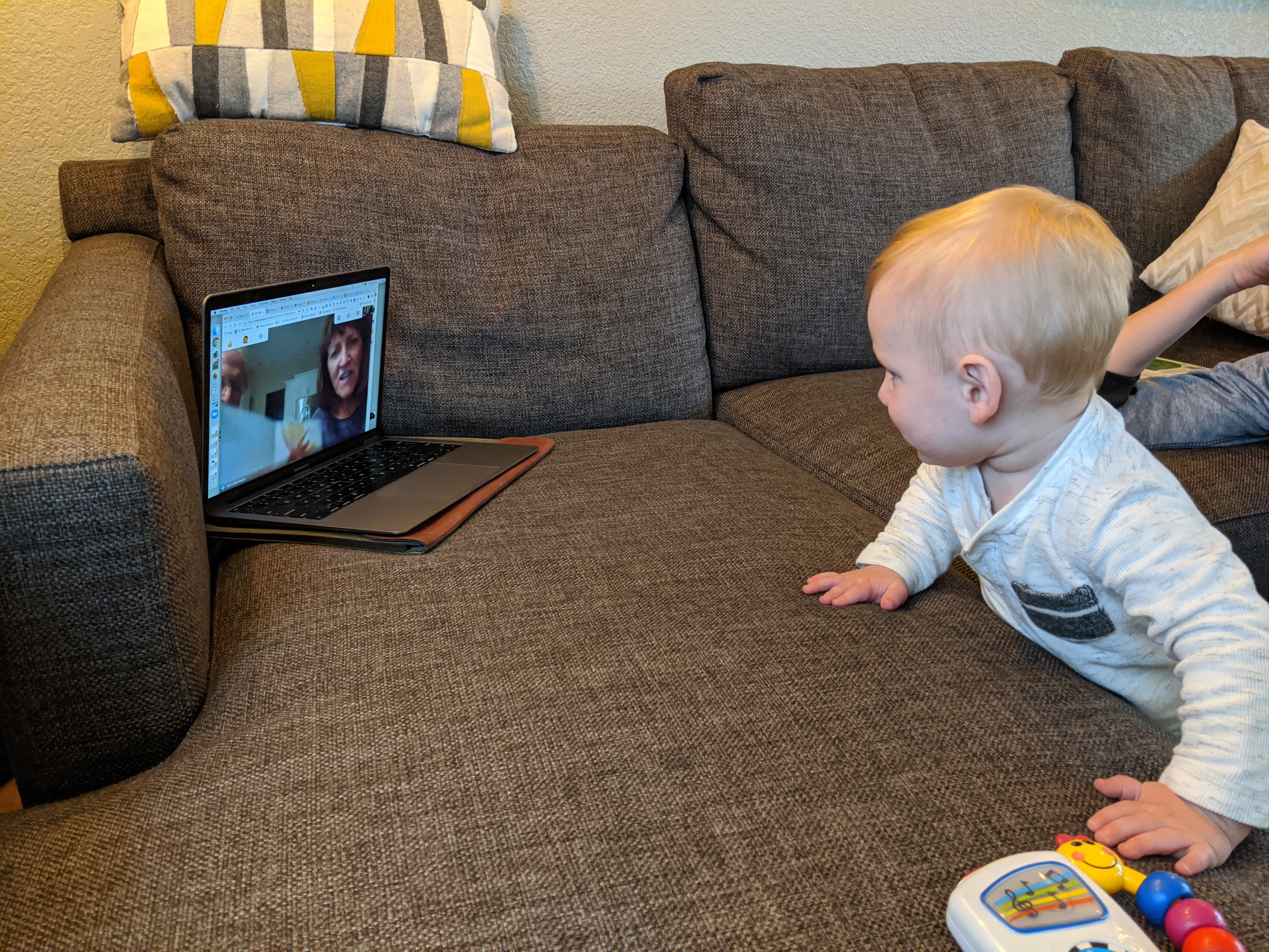 Grandma Ellen reads to Owen over the internet during quarantine.