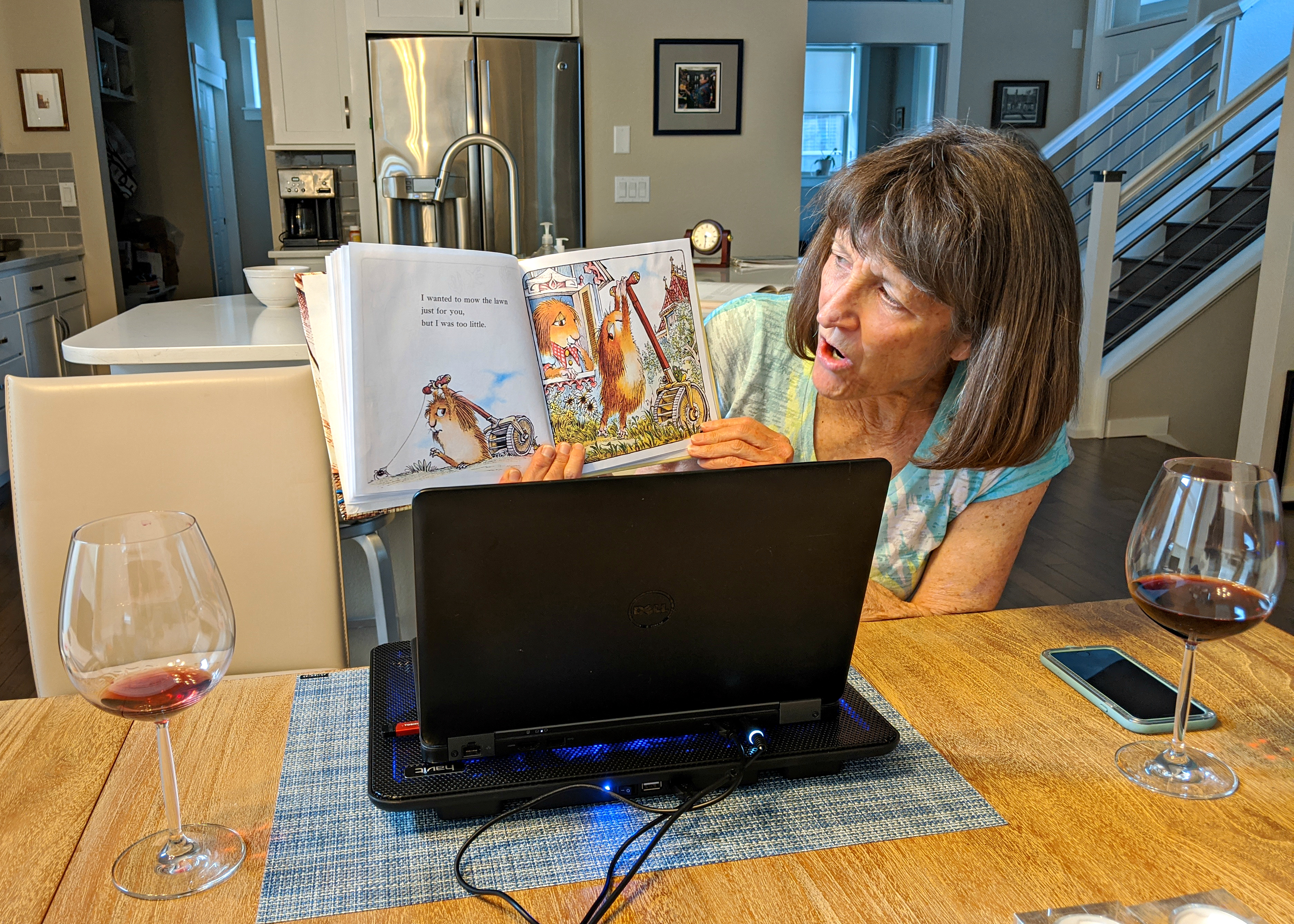 Grandma Ellen reads to Owen over the internet during quarantine.