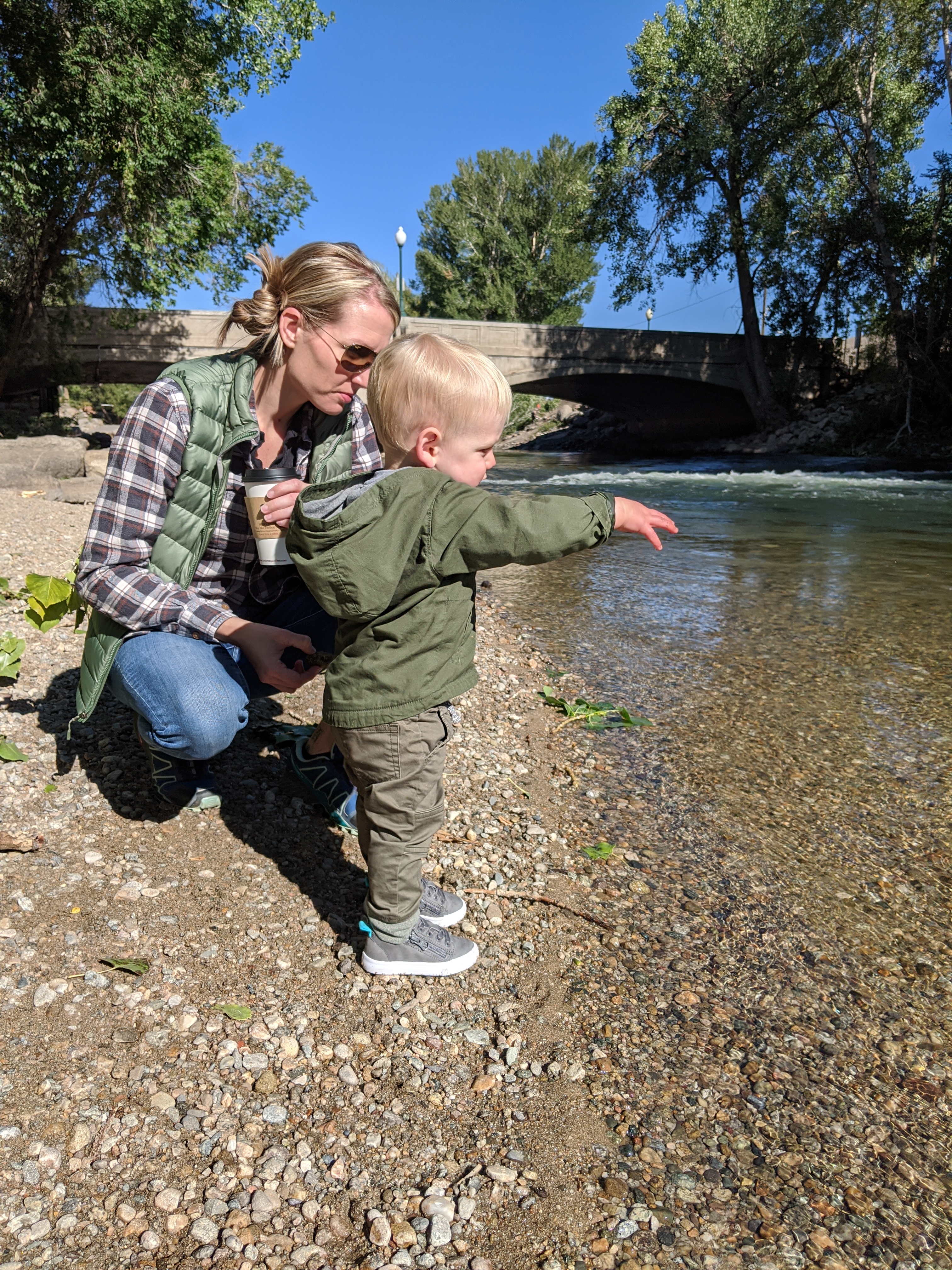 Katie and Owen on the bank of the Arkansas river in Salida.