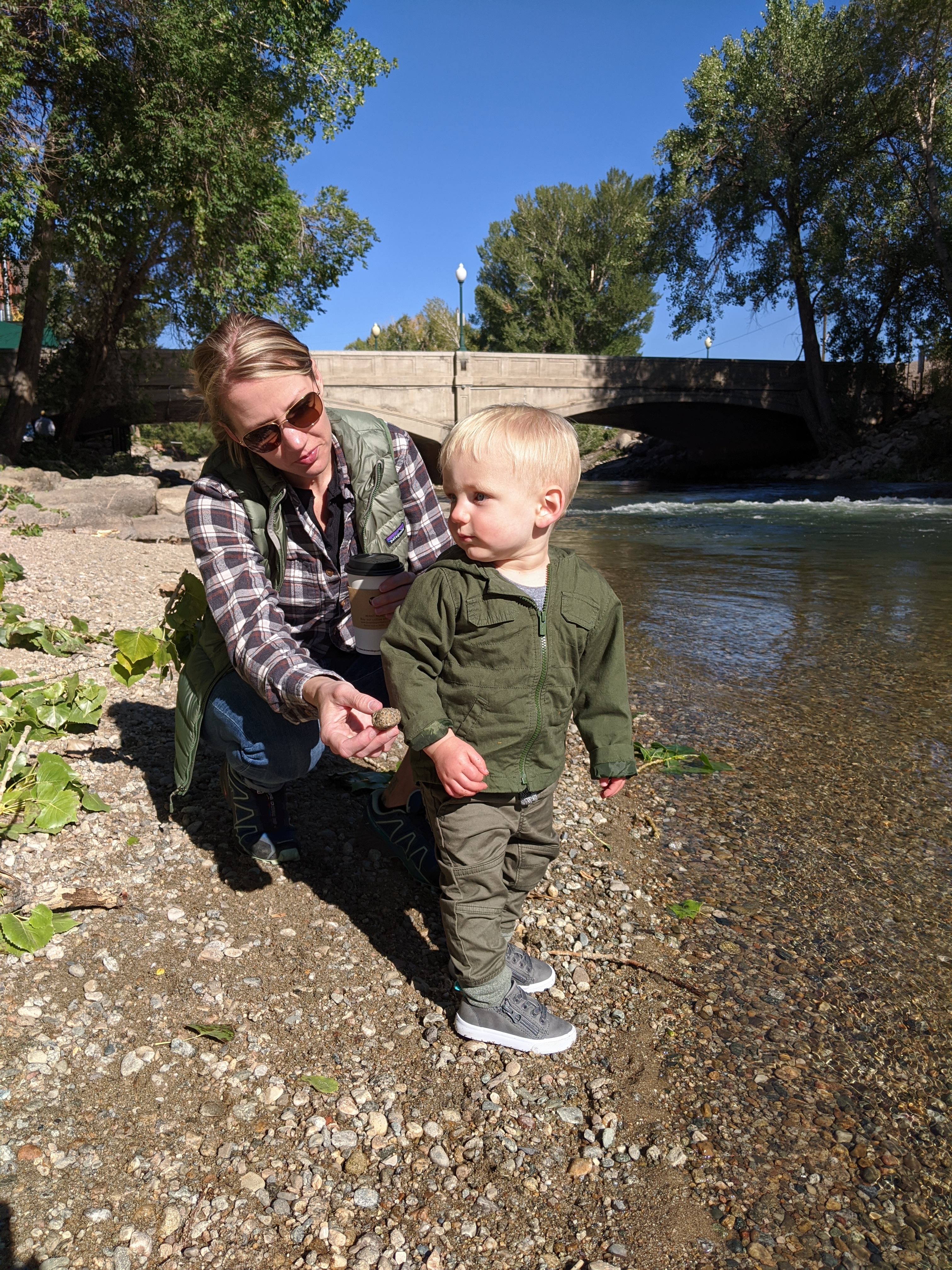 Katie and Owen on the bank of the Arkansas river in Salida.