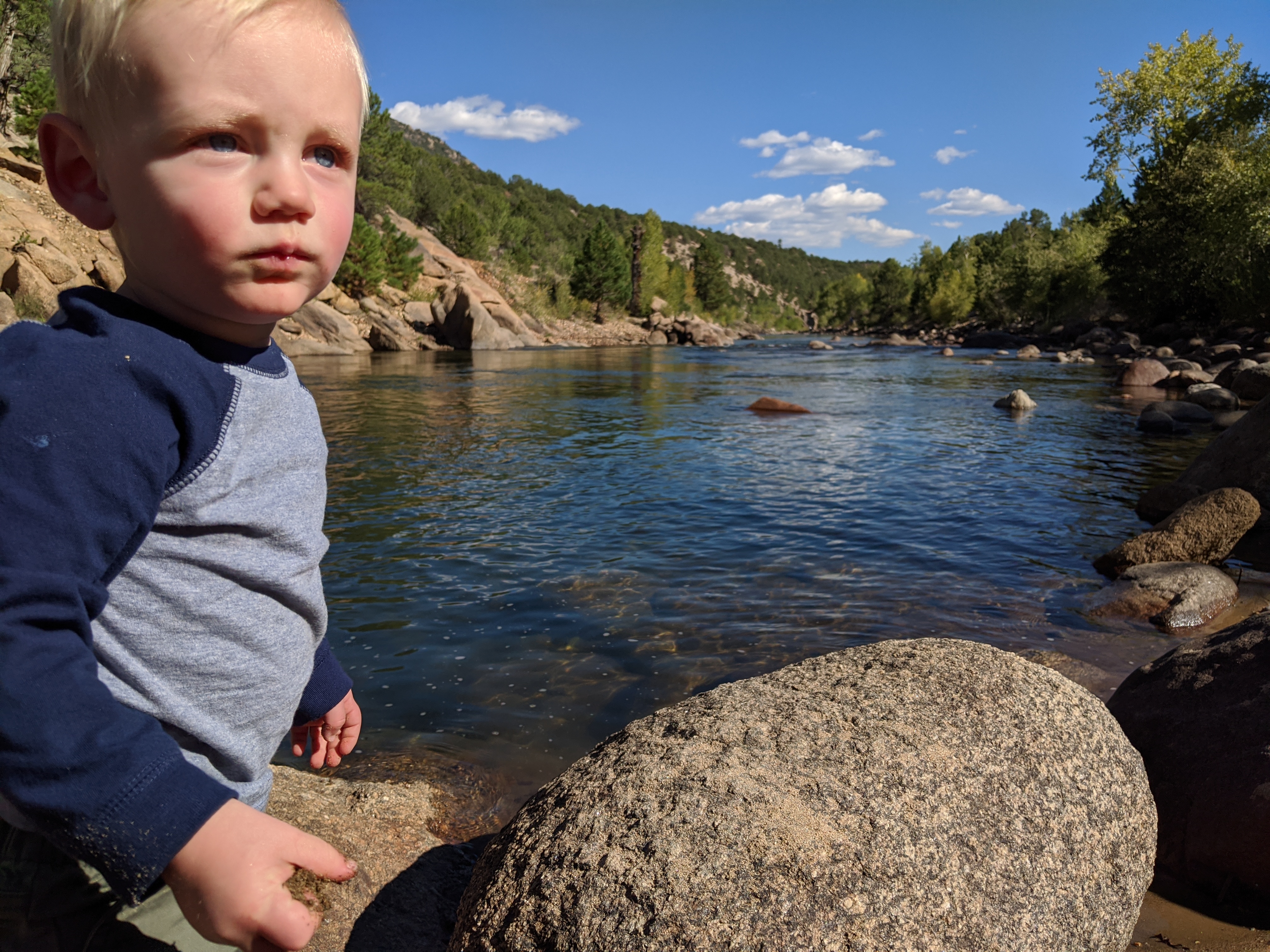 Katie and Owen on the bank of the Arkansas river in Salida.